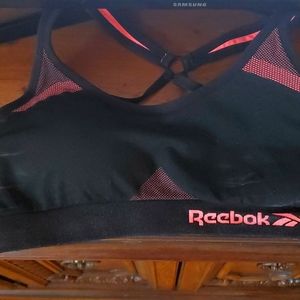Small pink/black reebok sports bra